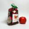 Irish Twins Apple Cinnamon Potpourri bag with a green bow and a single red apple on a white background.