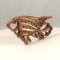 Handcrafted wooden tropical fish ornament made from 1/4-inch thick oak, finished with shellac, designed for holiday decor or year-round display as wall art.