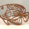Handcrafted wooden tropical fish ornament made from 1/4-inch thick oak, finished with shellac, designed for holiday decor or year-round display as wall art.