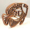 Handcrafted wooden tropical fish ornament made from 1/4-inch thick oak, finished with shellac, designed for holiday decor or year-round display as wall art.