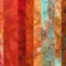 Hand dyed quilting cotton stash bundle in shades of orange and red