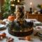 Elegant handmade centerpiece with pinecones and greenery on a rustic wood base; timeless neutral decor for any season.