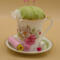 This is an example to show how easily bobbins and thread fit on the saucer. Bobbins and thread are NOT included in the sale.