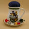 This shows an example of bobbins and thread in the holder. They are not included in the sale.