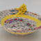 Looking from the front, the yellow fabric provides a nice contrast to the multicolored fabric and shows off the knot. 