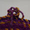 A view of the knot from the inside of the bowl, showing all of the twists.