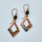 Handmade flame-colored copper earrings with diamond shaped copper dangles and tourmaline beads on handcrafted wires.
