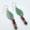 Handmade autumn leaf earrings with aventurine leaves and tourmaline beads in fall colors on stainless steel chain.