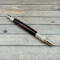 Exotic dark Mexican Cocobolo wood and brass click pen