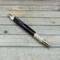 Dark wood and brass click pen 