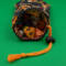 This is showing the opening of the bag with the dice inside.