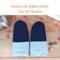 Pair of wool navy blue thumbless baby mittens with text ‘Perfect for Babies from 0 to 36 Months’; soft fleece winter mittens for toddlers.