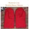Pair of warm and cozy red wool men's mittens on rustic wood background — winter extra large mittens for men.
