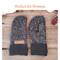 Pair of black and white speckled fleece regular sized mittens; soft fleece lined winter gloves for women.