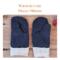 Pair of warm and cozy blue fleece regular sized women's mittens on rustic wood background — winter mittens for woman.
