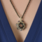 Yellow Petal Bloom Necklace featuring cream and black beaded pendant with floral-inspired shape.