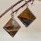 Handmade flame-colored copper diamond earrings with UV resin seal and handcrafted copper ear wires.