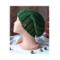 A hand knit green acrylic beanie in a ribbing stretchy stitch pattern. For winter holiday gifting for kids ages 10, 11, 12, 13, 14.