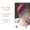 A babies & toddlers sized rainbow ombre hat knit with wool. Perfect for winter a gift for a baby or toddler ages 1, 2, 3, 4, 5 years old.