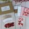 A valentine card making kit to create 12 of your own postcard style valentines with cardstock, paper, and embellishments.
