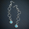 Very pretty pair of dangle earrings. they are western with a concho char,
