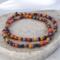 bight flame colored seed beads on a stretch cord.