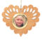 Wooden heart-shaped ornament with scalloped edges and an oak grain finish, featuring a removable round gold frame that holds a photo of a smiling blonde child.