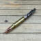 Gunmetal rifle clip on a real 308 cartridge ballpoint pen
