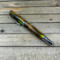 Arizona jumping cholla cactus rollerball pen with bright green resin 