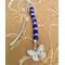 We designed this more for our younger readers, but that doesn't mean adults can't purchase them!  Bright royal blue beads, with a smooth clean hook with no design.  The butterfly is very nice and dlifhtweight..  We did more pics for this viewing.