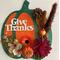 A 3D decorative pumpkin for the fall and Thanksgiving.  Hancrafted and available in two different foliage and paints for "Give Thanks". Beautiful orange and dark green are the main colors but the harvest was plentiful with choices of flowers and fall items.