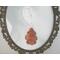 Copper Oak Leaf Earring on Framed photo of head
