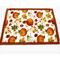 Front of hot pad.  Pumpkins and leaves on white background.