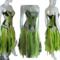 A black and lime green tattered dress with touches of white. A lace up back for a great fit. Features crochet on the bodice and is a fun event dress. One of a kind, hand made, eco-friendly bohemian style dress.