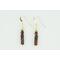 dainty brown zebra striped onyx earrings accented with a bead at the top and gold ear wires