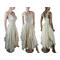 A long, cream tattered wedding dress. Soft varying lengths of fabric in the skirt and has a high low skirt. The shoulder straps have flowers making it very feminine and pretty. One of a kind, handmade, eco-friendly, bohemian style dress.