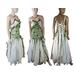 Green and white woodland wedding dress. Lace up back. The bodice has green crochet and flowers and leaves sewn into around the crochet. Lots of white tatters with occasional green. One of a kind, handmade, eco-friendly, bohemian style clothes.
