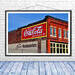 A classic site in downtown Knoxville, this brightly colored, painted brick building says &quot;Drink Coca-Cola - Made in Knoxville 5 cents&quot; and &quot;Carpet Headquarters&quot; Fine Art Print by K Emlen Photography
