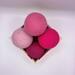 Pink dryer balls from top