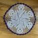 ghost doily showing purple border