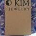 Earrings come gift-ready in a recyclable O Kim Jewelry box like this one.