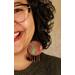 Gracey modeling chandelier earrings to show size comparison