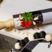 Buffalo check rolling pin with red and green flowers