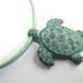 Copper sea turtle pendant on your choice of leather . necklace. 
Green