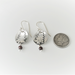 sterling silver tree on round 5.8" disc dangle pierced earrings with dark red garnet bead