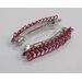 Red and pink chainmaille barrettes made with anodized aluminum in a European 4-in-1 pattern, handmade in the USA by RainbowMaille
