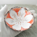 lotus copper enamel trinket dish in palm of hand