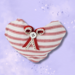 White with red stripes heart pillow with red and white bow