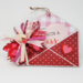 Red envelope with pink and white check