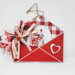 Red envelope with red and white check